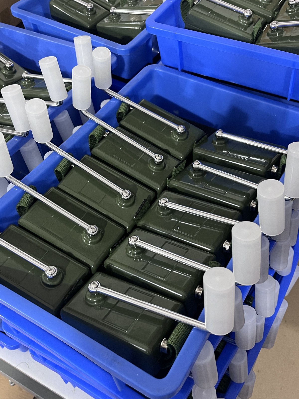 Finished hand crank generator units arranged after bulk production